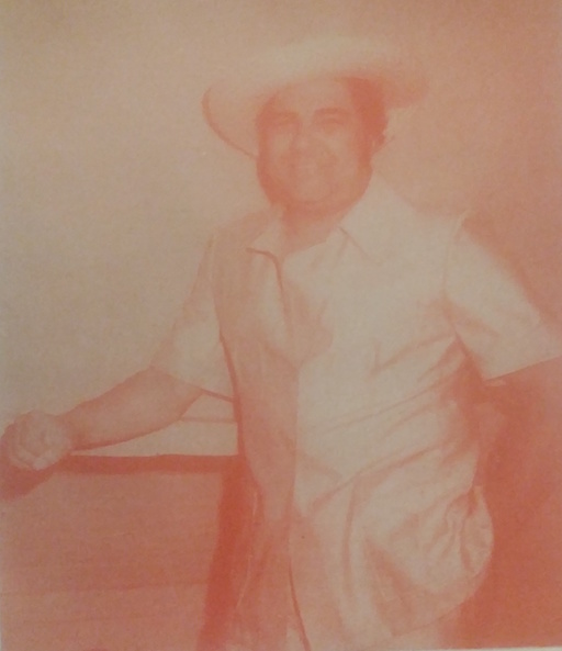 Alfredo Sadel, wearing a sombrero de cogollo and a guayabera, in a sepia-toned picture