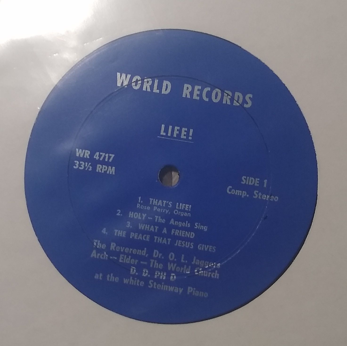 The center of the record, showing the title clearly as "Life!"
